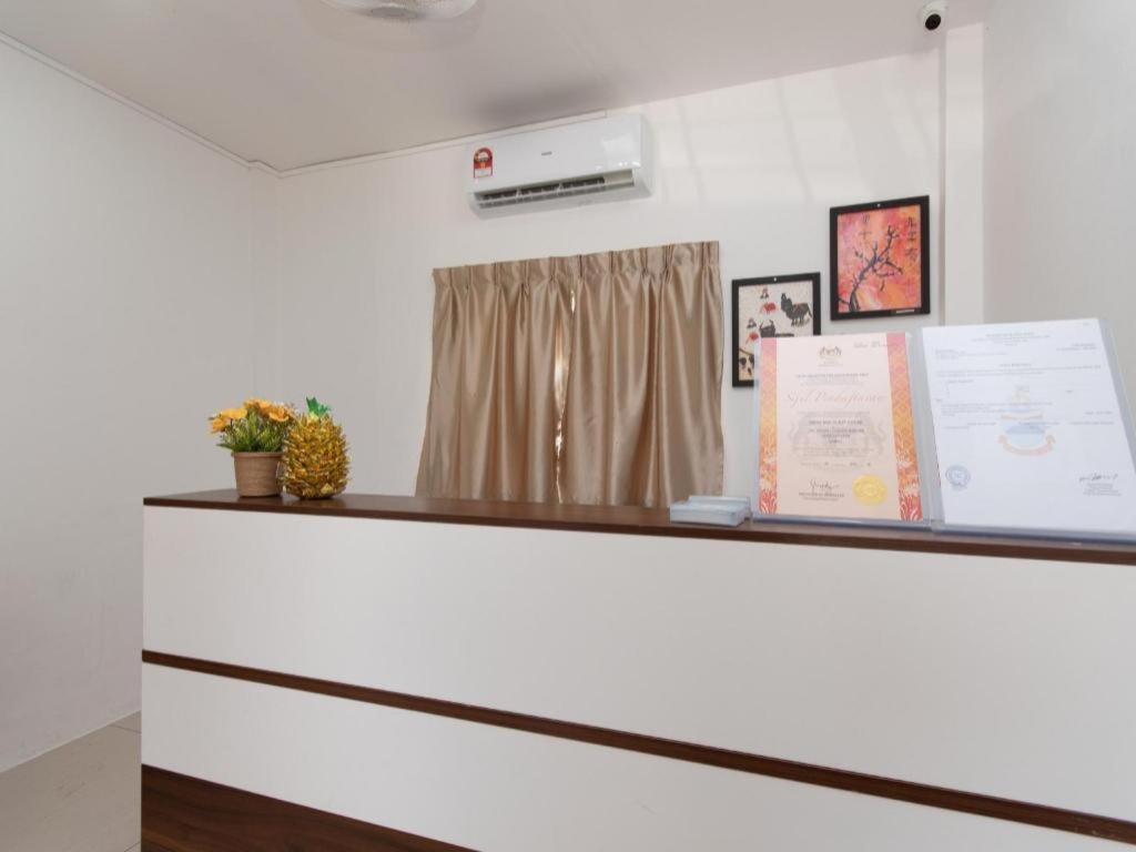 Oyo 44011 Weng Bee Guest House Kota Kinabalu Exterior photo