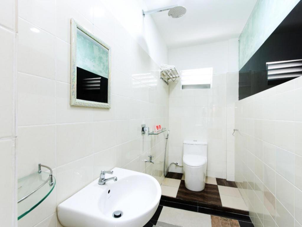 Oyo 44011 Weng Bee Guest House Kota Kinabalu Exterior photo