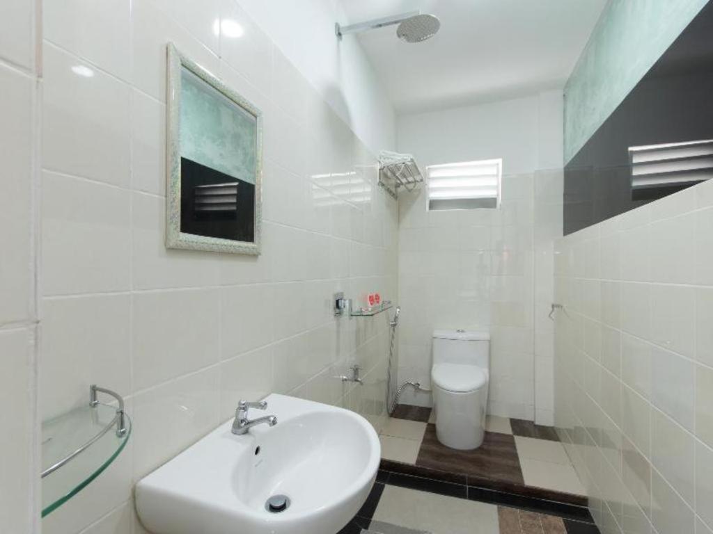 Oyo 44011 Weng Bee Guest House Kota Kinabalu Exterior photo