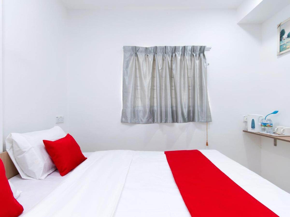 Oyo 44011 Weng Bee Guest House Kota Kinabalu Exterior photo